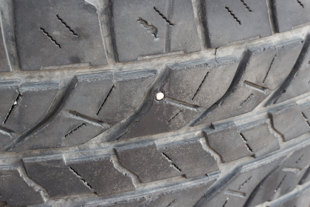 Is it Safe to Drive With a Nail in My Tire? YourMechanic Advice